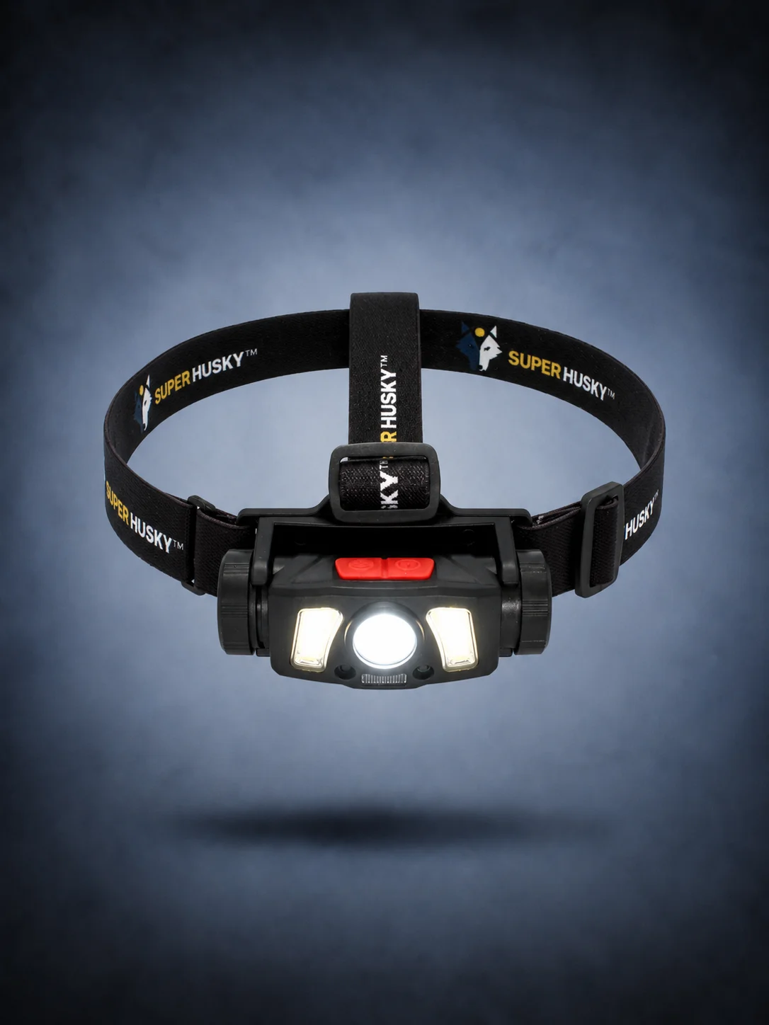Lampe frontale rechargeable Super Husky HYBRID600 allumée avec bandeau ajustable, éclairage LED central et COB latéraux pour vélo, outdoor et déplacements nocturnes.
